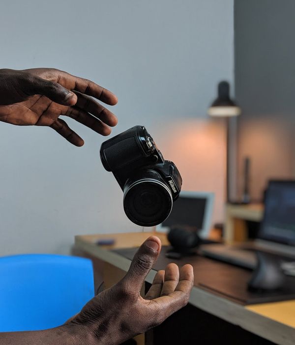 Person in motion, captured mid-stride in a minimalist space.